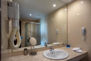 Koupelna v ubytování Selena Hotel