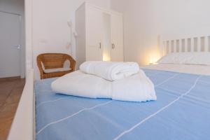 Posteľ alebo postele v izbe v ubytovaní Sea view New Apartment Ortigia