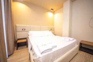 Postel nebo postele na pokoji v ubytování Hotel Alion21