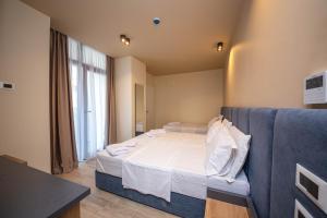 Postel nebo postele na pokoji v ubytování Hotel Alion21