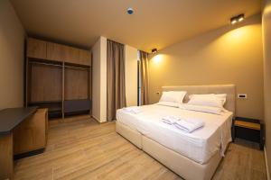 Postel nebo postele na pokoji v ubytování Hotel Alion21
