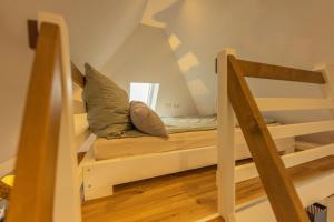 Krevet ili kreveti na kat u jedinici u objektu Loftwohnung mit Burgblick und Charme