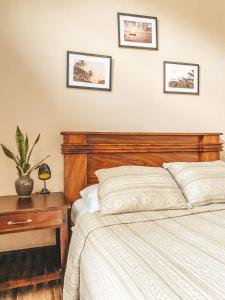 Ein Bett oder Betten in einem Zimmer der Unterkunft Casa Papaki