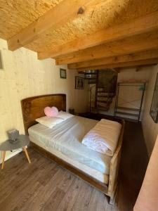 Łóżko lub łóżka w pokoju w obiekcie Maison typique Corse