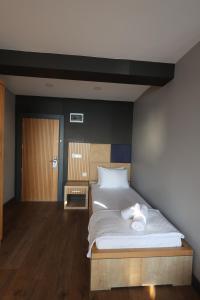 Postel nebo postele na pokoji v ubytování Taşliman Otel
