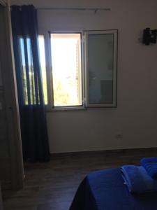 Letto o letti in una camera di Sardegna Mer et Soleil in Olbia