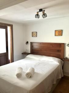 Postel nebo postele na pokoji v ubytování Casa Bernardita