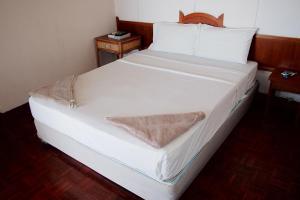 Postel nebo postele na pokoji v ubytování Hi coral cove bungalow