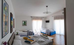 Postel nebo postele na pokoji v ubytování Queen's Bed & Breakfast