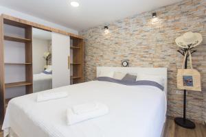 Posteľ alebo postele v izbe v ubytovaní Studio Nomadic Kastela