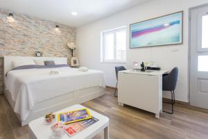 Posteľ alebo postele v izbe v ubytovaní Studio Nomadic Kastela
