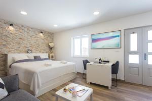 Posteľ alebo postele v izbe v ubytovaní Studio Nomadic Kastela