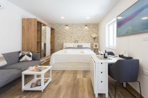 Posteľ alebo postele v izbe v ubytovaní Studio Nomadic Kastela