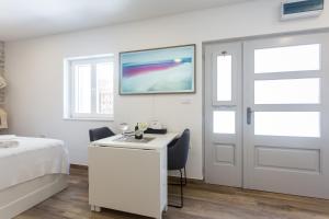 Posteľ alebo postele v izbe v ubytovaní Studio Nomadic Kastela