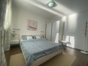 Postel nebo postele na pokoji v ubytování Adria apartmani