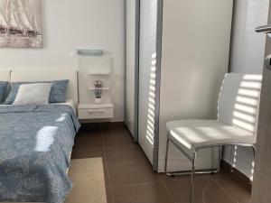 Postel nebo postele na pokoji v ubytování Adria apartmani