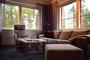 Гостиная зона в Castillo Kelotähti Apartment