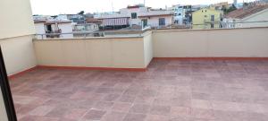 Un balcón o terraza en Casa Corso Umberto 244 piano 3°