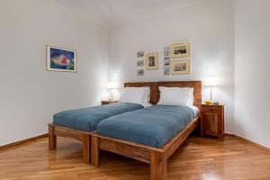 Posteľ alebo postele v izbe v ubytovaní Luxury Museum Apartment Athena