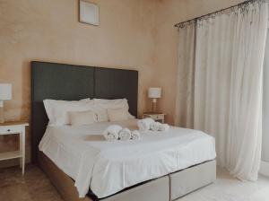 Cama ou camas em um quarto em Case Marianeddi