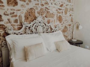 Cama ou camas em um quarto em Case Marianeddi