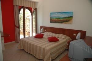 Postel nebo postele na pokoji v ubytování Agriturismo L'Arca di Anna Brambilla