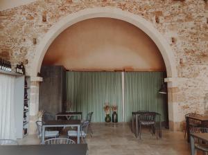 Um restaurante ou outro lugar para comer em Case Marianeddi