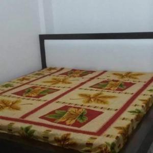 Postel nebo postele na pokoji v ubytování Govind Guest House
