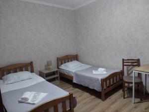 Ένα ή περισσότερα κρεβάτια σε δωμάτιο στο Sesilia