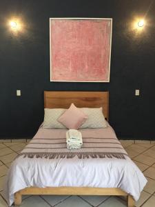 Rúm í herbergi á Ekko Hostel