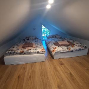 Posteľ alebo postele v izbe v ubytovaní Dom Gościnny "Pod Siódemką" + 37 fotografií