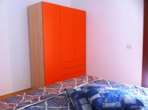 Ένα ή περισσότερα κρεβάτια σε δωμάτιο στο Luna Case Vacanza La Mendula