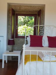 Een bed of bedden in een kamer bij Casas da Quinta da Cancela