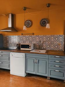 Dapur atau dapur kecil di Casas da Quinta da Cancela