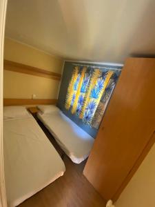 Łóżko lub łóżka w pokoju w obiekcie La Gobita