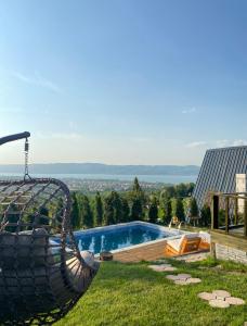 a large tire swing hanging from the side of a house at Sapanca Mea Vita in Sapanca