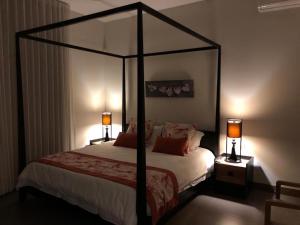 Postel nebo postele na pokoji v ubytování Penthouse 3 chambres Vue Lagon imprenable