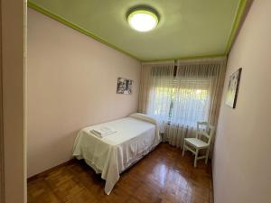 Posteľ alebo postele v izbe v ubytovaní Casa SIDRO