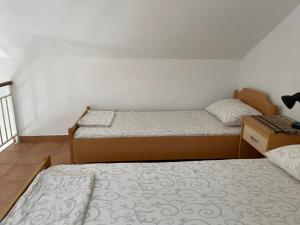 Posteľ alebo postele v izbe v ubytovaní Melita Apartements