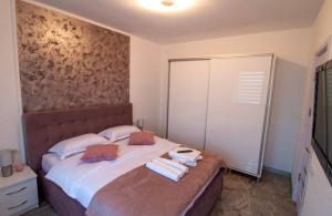 Postel nebo postele na pokoji v ubytování Apartament Paradis Eforie nord
