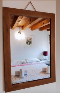 A bed or beds in a room at Casa Napoleoni