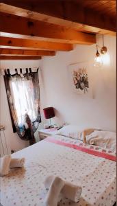 A bed or beds in a room at Casa Napoleoni
