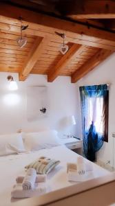 A bed or beds in a room at Casa Napoleoni