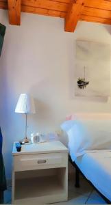 A bed or beds in a room at Casa Napoleoni