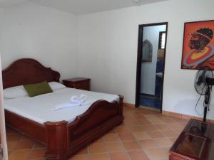 Łóżko lub łóżka w pokoju w obiekcie Finca Hotel La Consentida Escondida