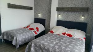 Llit o llits en una habitació de Over Lake-domki,apartamenty