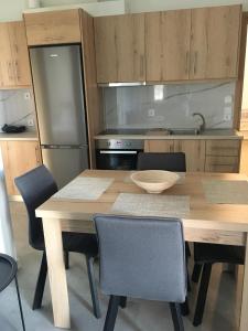Kuchyň nebo kuchyňský kout v ubytování Alkioni's Nest Apartments