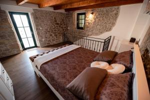 Tempat tidur dalam kamar di Didov dvor