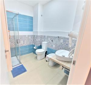 Koupelna v ubytování iMama' Rooms