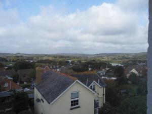 a view of a town with a white house at The Sandhill in Sandown